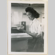 Woman using a typewriter (ddr-densho-37-1002)