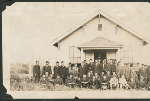 Group photo of men outside a building (ddr-densho-483-257)