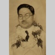 Juji Kasai wearing leis (ddr-njpa-4-637)