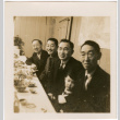 Four men and a boy seated at table with plates of food (ddr-densho-426-1702)