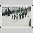 Skiers stand on hillside (ddr-densho-321-339)