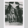 Four servicepeople with plane at Myitkyina Airfield (ddr-densho-1007-130)