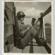 Soldier reading in lookout post (ddr-densho-201-165)