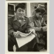 Soldier reading Stars and Stripes newspaper (ddr-densho-201-68)