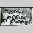 Photograph of hospital staff aides posing in front of the Manzanar hospital (ddr-csujad-47-253)