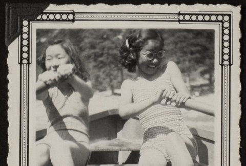 Two girls rowing (ddr-densho-542-380)