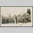 man by fence (ddr-densho-378-268)