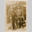 Two men in uniform on board ship (ddr-densho-426-2035)