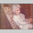 Agnes Sakura in chair (ddr-densho-523-640)