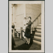 Woman and baby pose on boardwalk (ddr-densho-359-622)