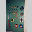 Display of small mirrors and wall racks (ddr-densho-426-1207)