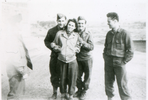 Three soldiers with woman (ddr-densho-1007-764)