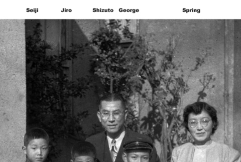 Shizuto Kawamura family outside house (ddr-ajah-6-11)