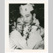 Two hugging (ddr-densho-1007-252)