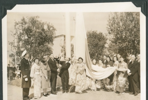 Raising the Japanese flag at the Golden Gate International Exposition (ddr-densho-300-192)
