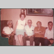 Three men and two women sitting on sofa (ddr-densho-523-628)