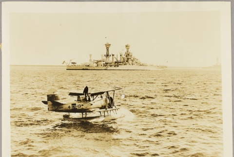 Seaplane floating near the USS Pennsylvania (ddr-njpa-13-120)
