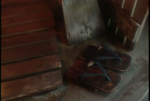 B-roll: bathhouse, fire, sandals (ddr-densho-1007-1742)