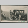 family photo next to a car (ddr-densho-378-576)