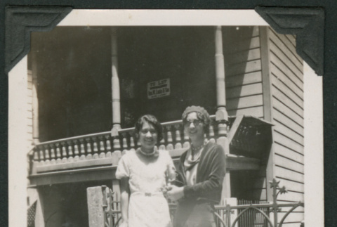 Two women outside a house (ddr-densho-378-161)