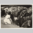 Woman kneeling by a stream (ddr-densho-542-825)