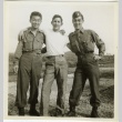 Two Japanese American soldiers posed with a white soldier (ddr-densho-201-85)
