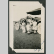 family photo in front of a car (ddr-densho-378-715)