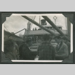 Men grouped near ship in background (ddr-densho-540-30)