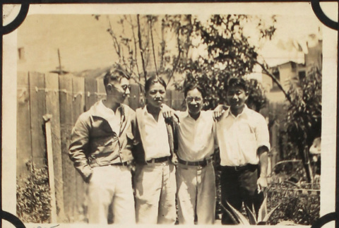 Four men standing in garden (ddr-densho-423-515)