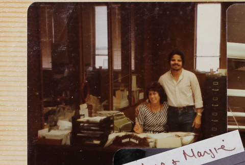 Man and woman by desk (ddr-densho-426-1272)