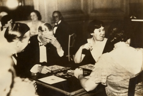 Henry Ford playing cards with Clara Ford and the Bryants (ddr-njpa-1-366)