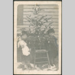 Two girls by Christmas tree (ddr-densho-293-108)