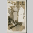 Couple in front of house (ddr-densho-359-349)