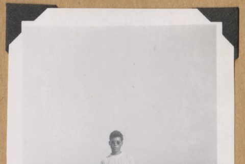Man standing on a cliff (ddr-densho-542-356)