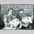 Photograph of women holding infants at Manzanar (ddr-csujad-47-233)