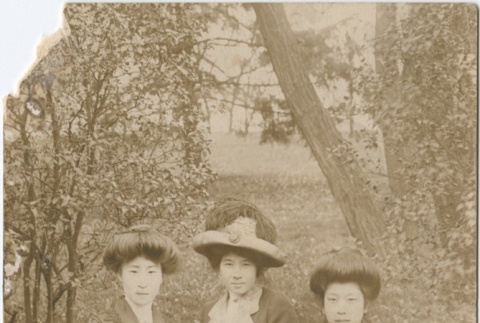 Three women seated outside (ddr-densho-321-511)