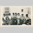 Train monitor group seated in an office (ddr-densho-37-890)