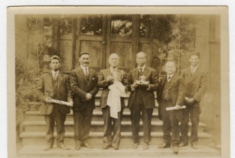 Outside the Hood River Japanese Community Hall after Masuo Yasui was honored for services rendered (ddr-densho-259-612)