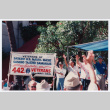 Veterans holding sign in veterans parade (ddr-densho-368-357)
