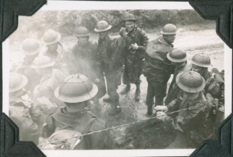 Group of men around small campfire (ddr-ajah-2-256)