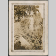 Woman standing in field (ddr-densho-316-182)