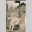 Woman holding baby (ddr-densho-523-110)