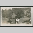 man on car (ddr-densho-378-890)