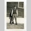 Soldier in front of a building (ddr-densho-22-166)