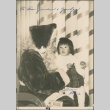 A young girl with Santa Claus (ddr-densho-321-1088)