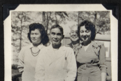 Four adults on a bridge (ddr-densho-542-728)