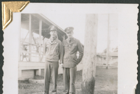Two men standing by walkway (ddr-densho-434-254)