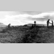Japanese Americans digging for shells (ddr-densho-2-47)
