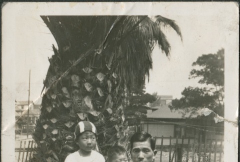A man with two children (ddr-densho-321-722)