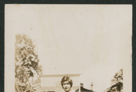 girl in garden (ddr-densho-378-586)